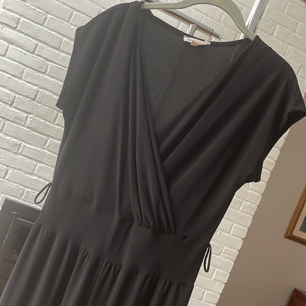 EUC Black Jumpsuit. Very pretty black jumpsuit.damage